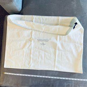 Kate Spade protective dust bag. 28” with black ribbon drawstring closure.